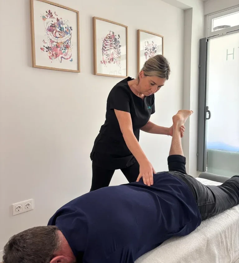 Sarah Monaghan providing chiropractic care at the Riviera del Sol clinic