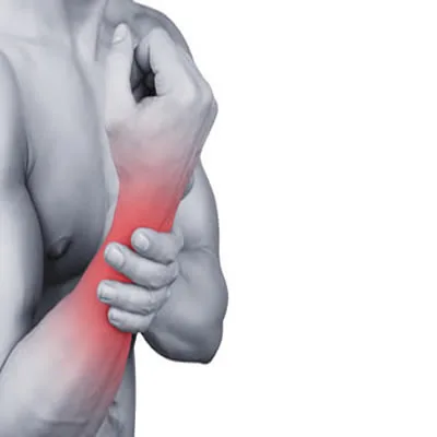 Person supporting a painful wrist